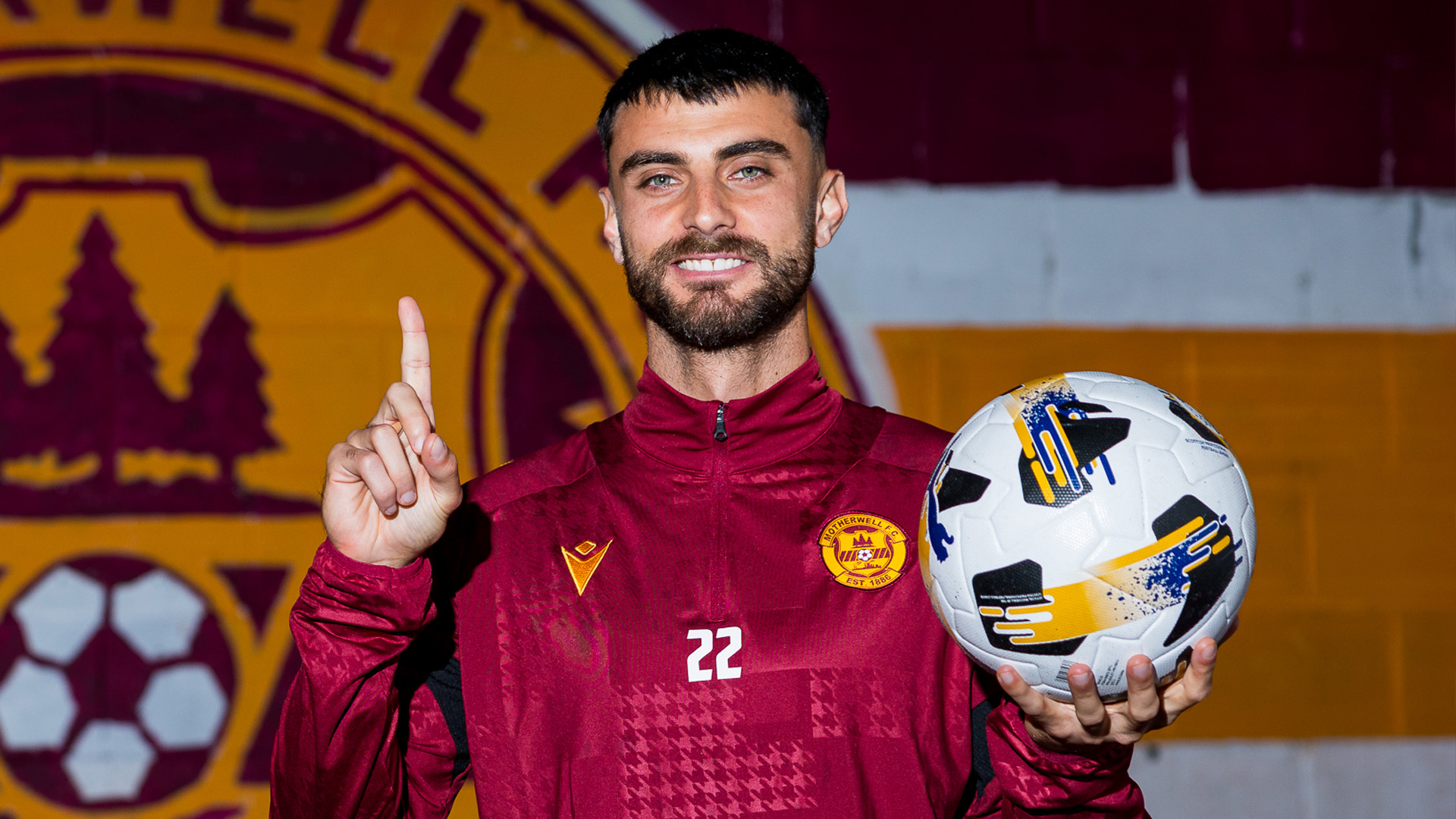 Johnny Koutroumbis ahead of Celtic